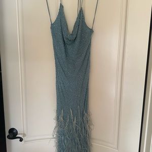 Beaded ball gown with feather detail